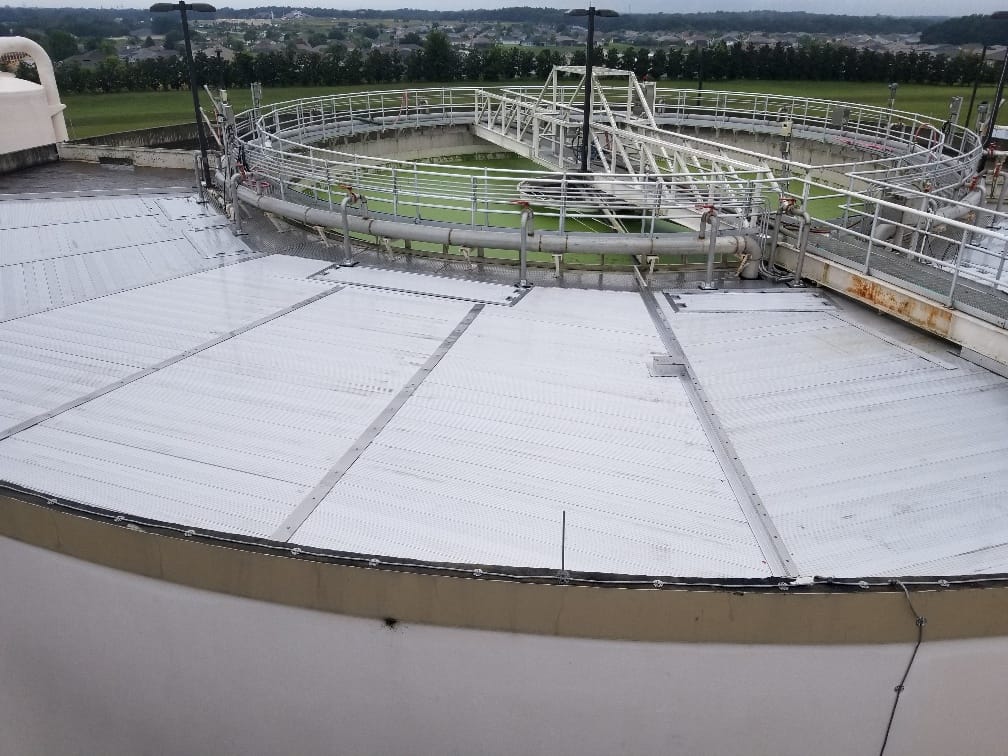 RPS Engineering IWPC 2026 — aluminum flat panel covers installed on a municipal wastewater clarifier